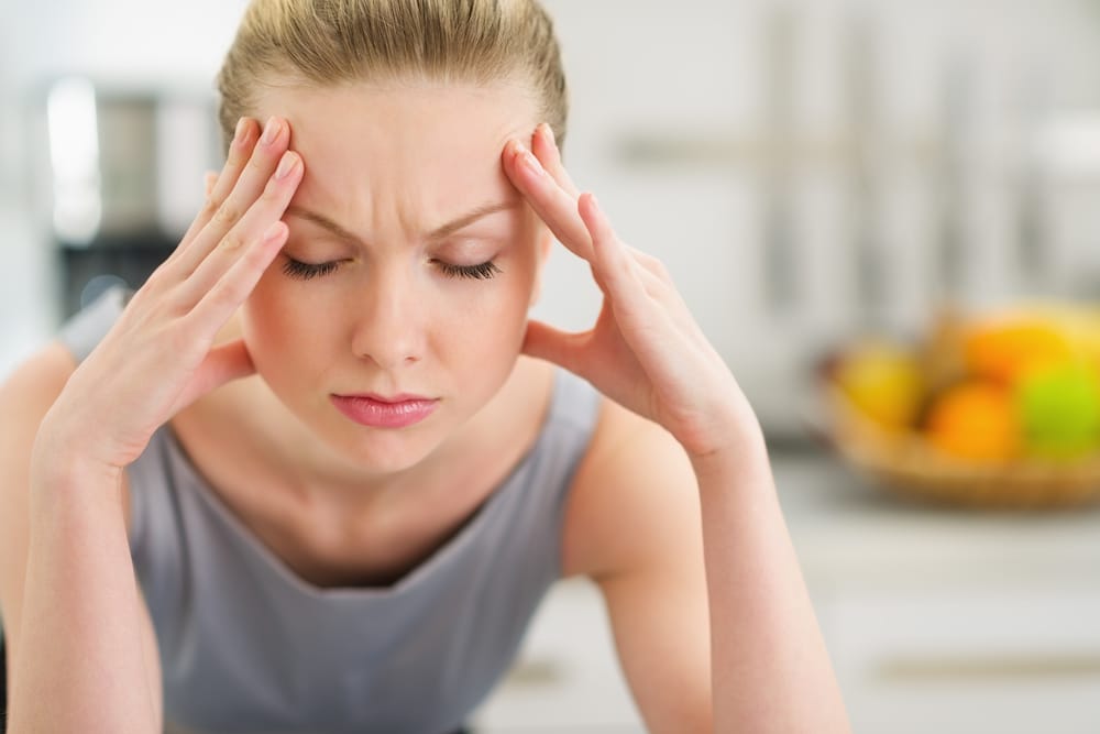 lady is having a headache