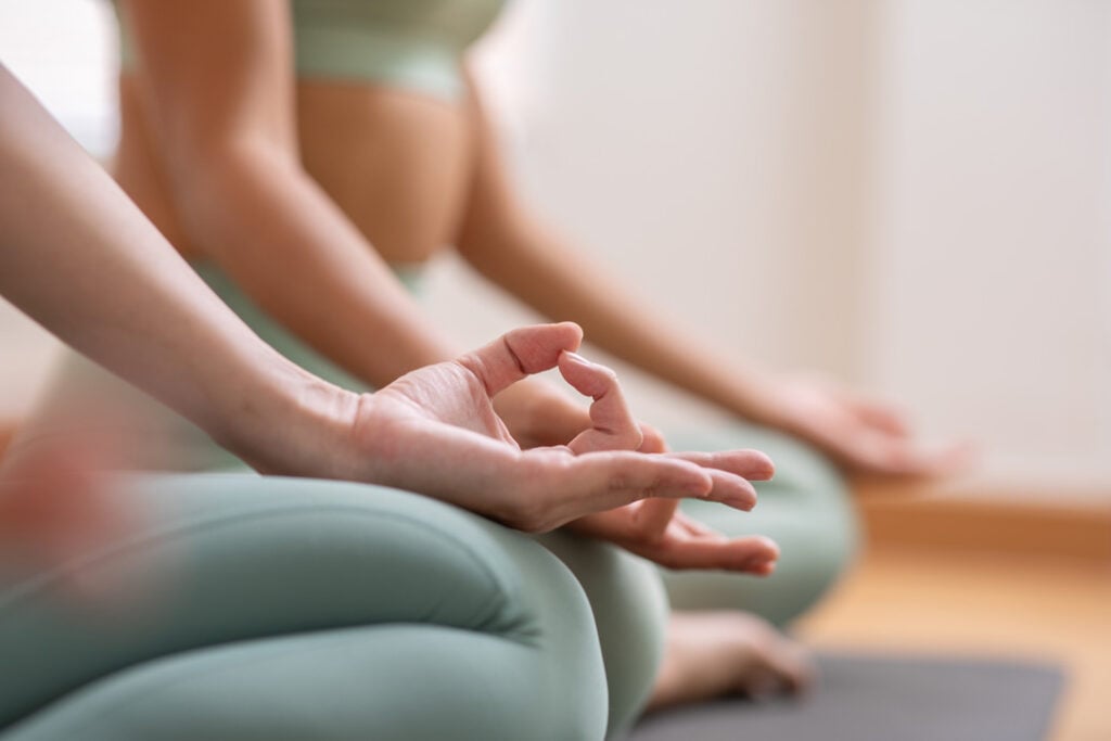 Asian yoga meditation breathing calm mindfulness wellness focus relaxation posture health balance stretch